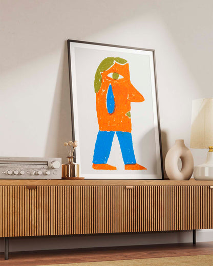Het werk van Ella "Mannetje" op een lage kast in een zwart kader.